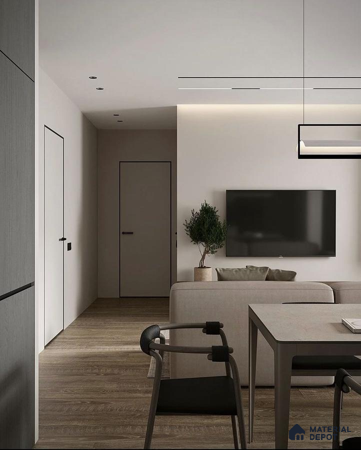 A kitchen with marble counter tops and stainless steel appliances on the wall, along with hanging lights hanging from the ceiling over the ceiling in front of a wooden counter top of a dining room table next to a